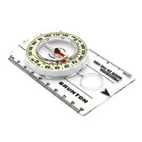 Brunton compass on a white background