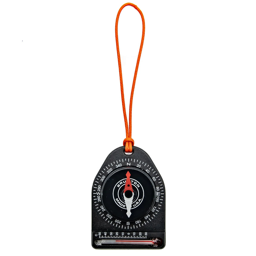 Compass with orange strap on a white background