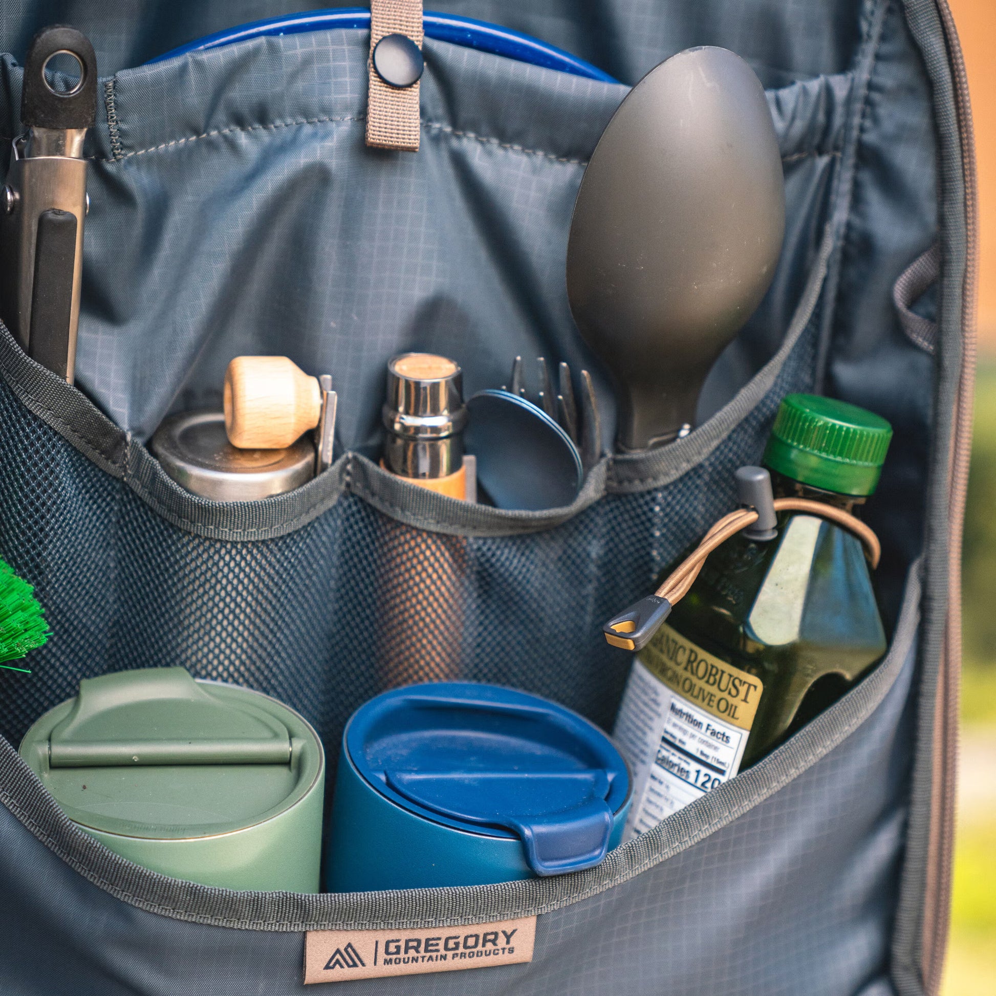 Gregory Alpaca Kitchen Case in Slate Blue - Hanging with Bottles
