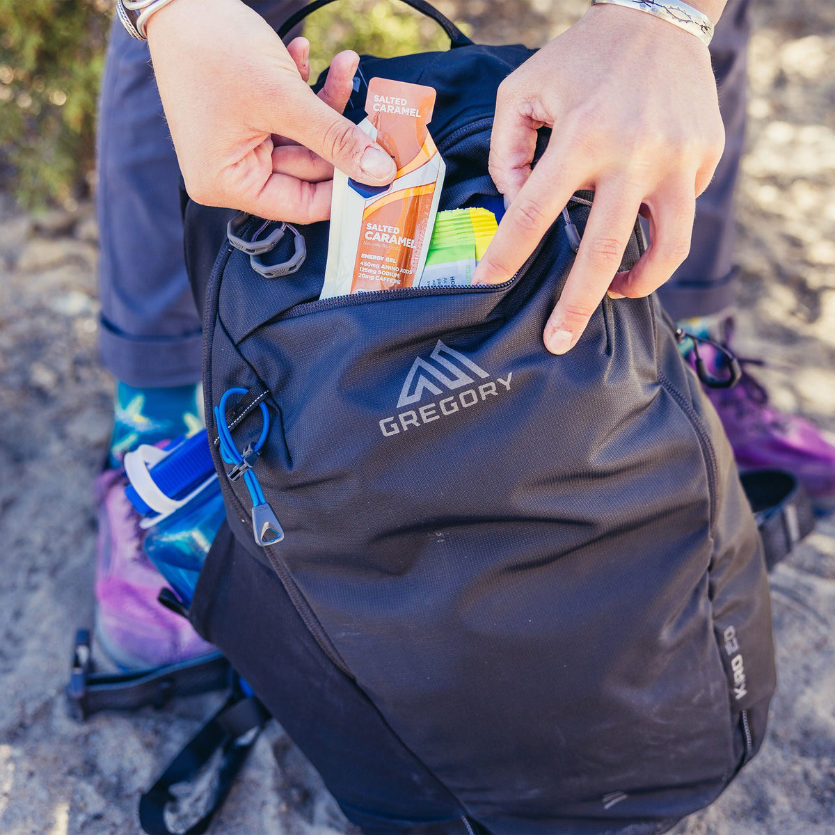 Gregory Kiro 20L Daypack in Alpine Black - top pocket detail, worn