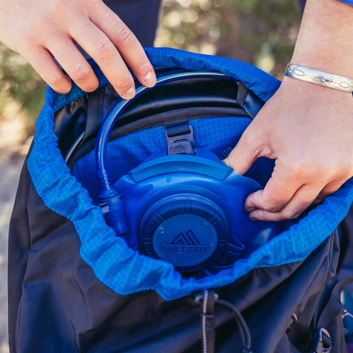 Gregory Kiro 28L Daypack in Alpine Black - hydration sleeve detail, worn