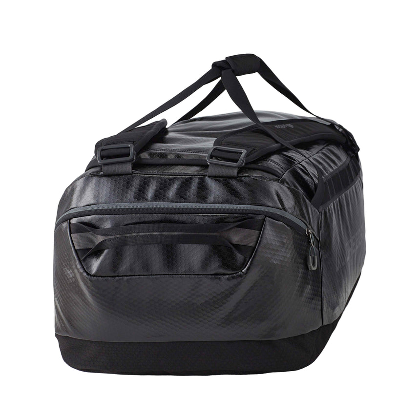 Gregory Alpaca 60L Duffel Bag in Obsidian Black - Side View showing removable backpack straps