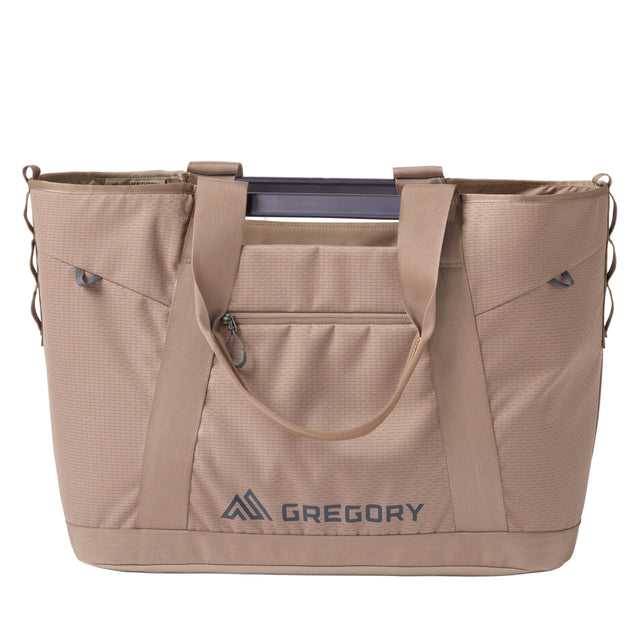Gregory Alpaca Utility Tote 50L in Mirage Tan - Front View with aluminium handles
