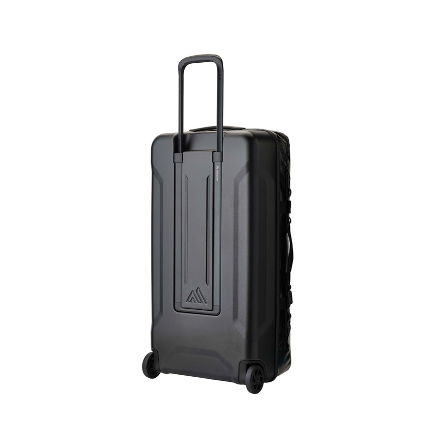Gregory Alpaca Wheeled Duffel 100L in Obsidian Black - Back View showing weatherproof hybrid construction