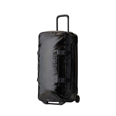 Gregory Alpaca Wheeled Duffel 100L in Obsidian Black - Front View with telescoping handle and oversized wheels