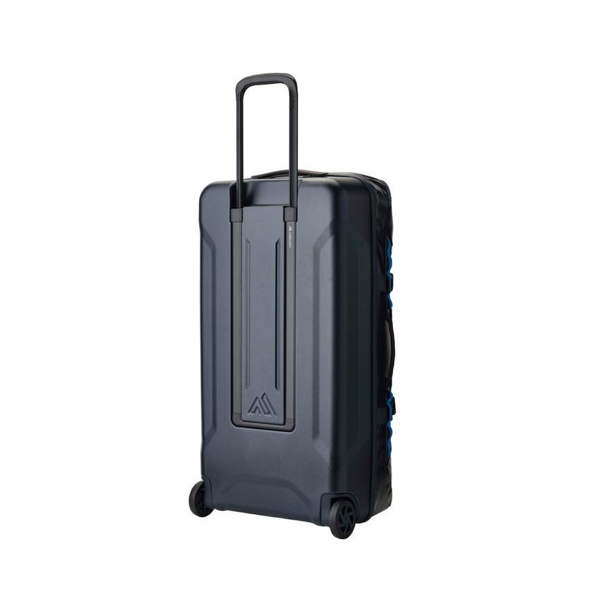 Gregory Alpaca Wheeled Duffel 100L in Slate Blue - Back View showing TPU-coated fabric and grab handles