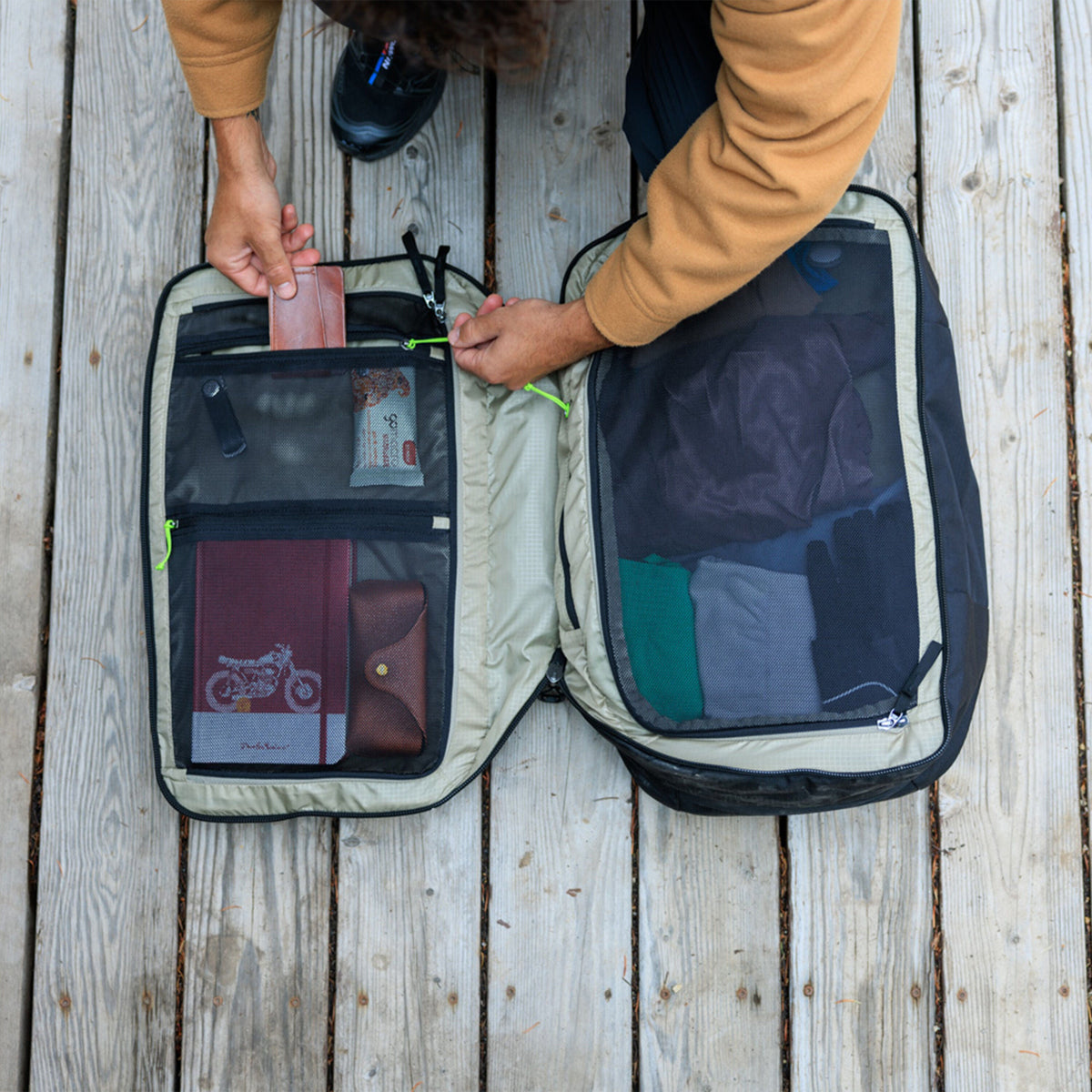 Gregory Border Carry-On 40L Interior Zippered Pocketing - transparent mesh for easy visibility into packed items