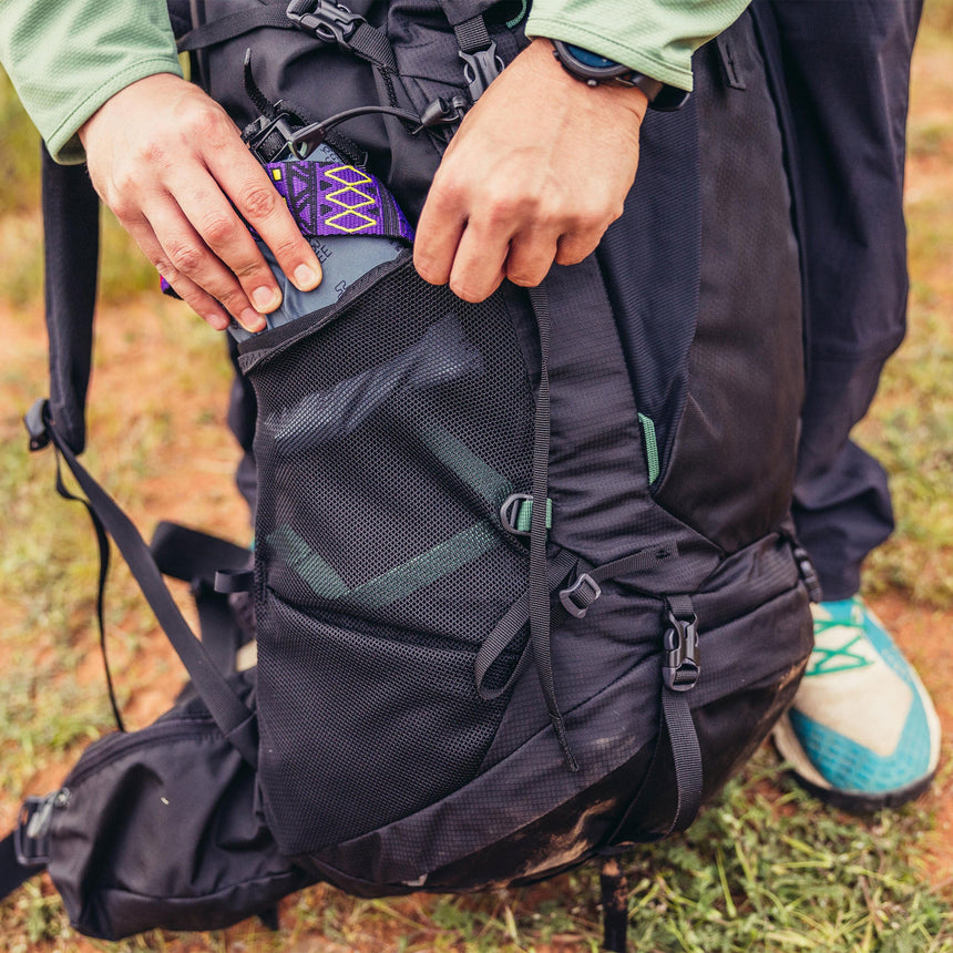 Gregory Stout 55 Dual-Side Mesh Pockets with side trail access and compression straps for water bottles