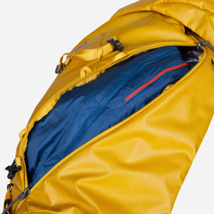Mountain Equipment Fang 42+ Backpack close up side zip storage image