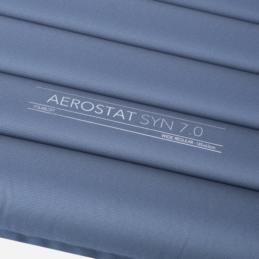 Mountain Equipment Aerostat Synthetic 7.0 Sleeping Mat in Ombre Blue - Close-Up of Product Details on Mat Fabric