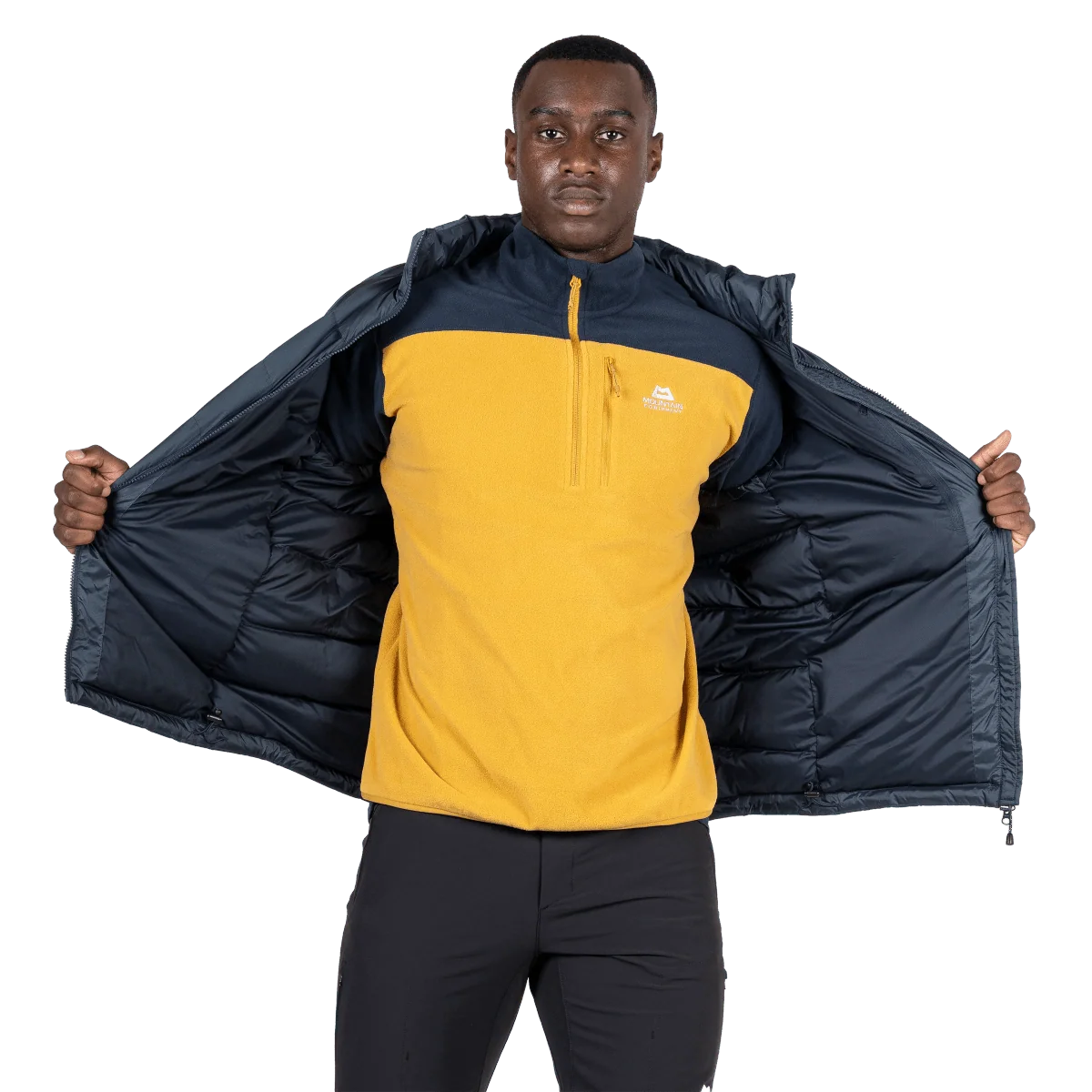 Mountain Equipment Lightline Men's Vest in Blue Nights - detail view on model showing inner lining and layering fit
