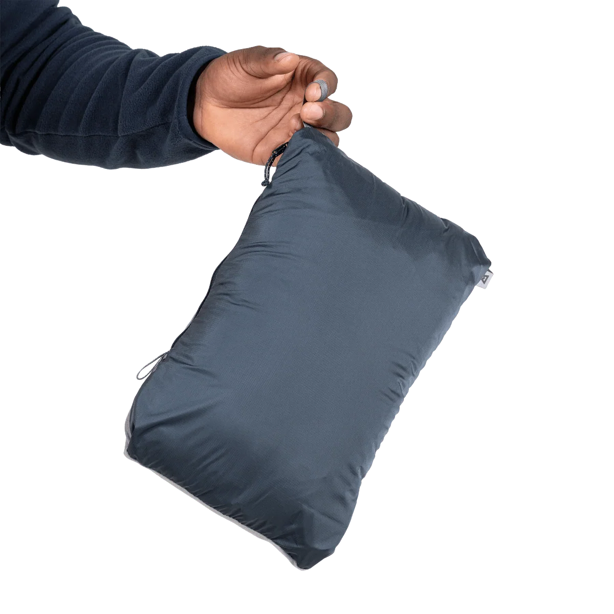 Mountain Equipment Lightline Men's Vest in Blue Nights packed into internal pocket showing lightweight packable construction