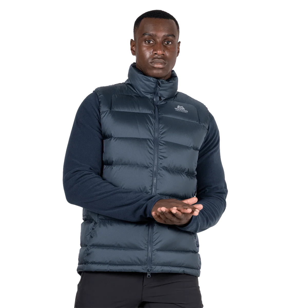 Mountain Equipment Lightline Men's Vest in Blue Nights - three quarter view on model