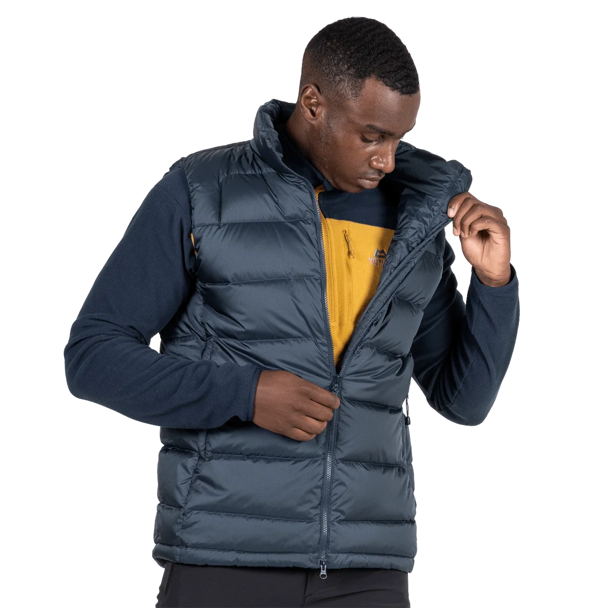 Mountain Equipment Lightline Men's Vest in Blue Nights - detail view on model showing 2-way YKK moulded centre front zip