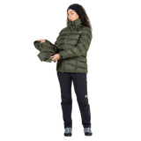 Mountain Equipment Lightline Women's Jacket in Buckthorn packed into stuff sack on model showing lightweight packable construction