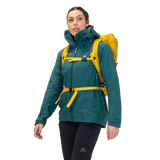 Mountain Equipment Odyssey Women's Jacket in Deep Teal - On Model With Pack