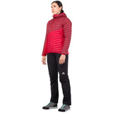 Mountain Equipment Particle Hooded Women's Jacket in Capsicum/Tibetan Red - Side Full Length on Model