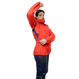 Mountain Equipment Tupilak Women's GORE-TEX Jacket in Chili Red - Arm Raise View on Model