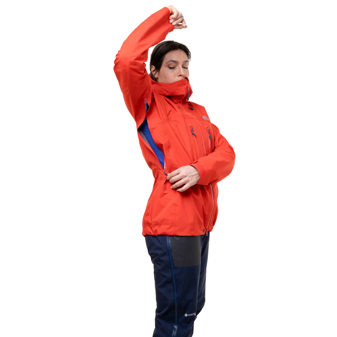 Mountain Equipment Tupilak Women's GORE-TEX Jacket in Chili Red - Arm Raise View on Model