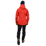 Mountain Equipment Tupilak Women's GORE-TEX Jacket in Chili Red - Hood Over Helmet on Model