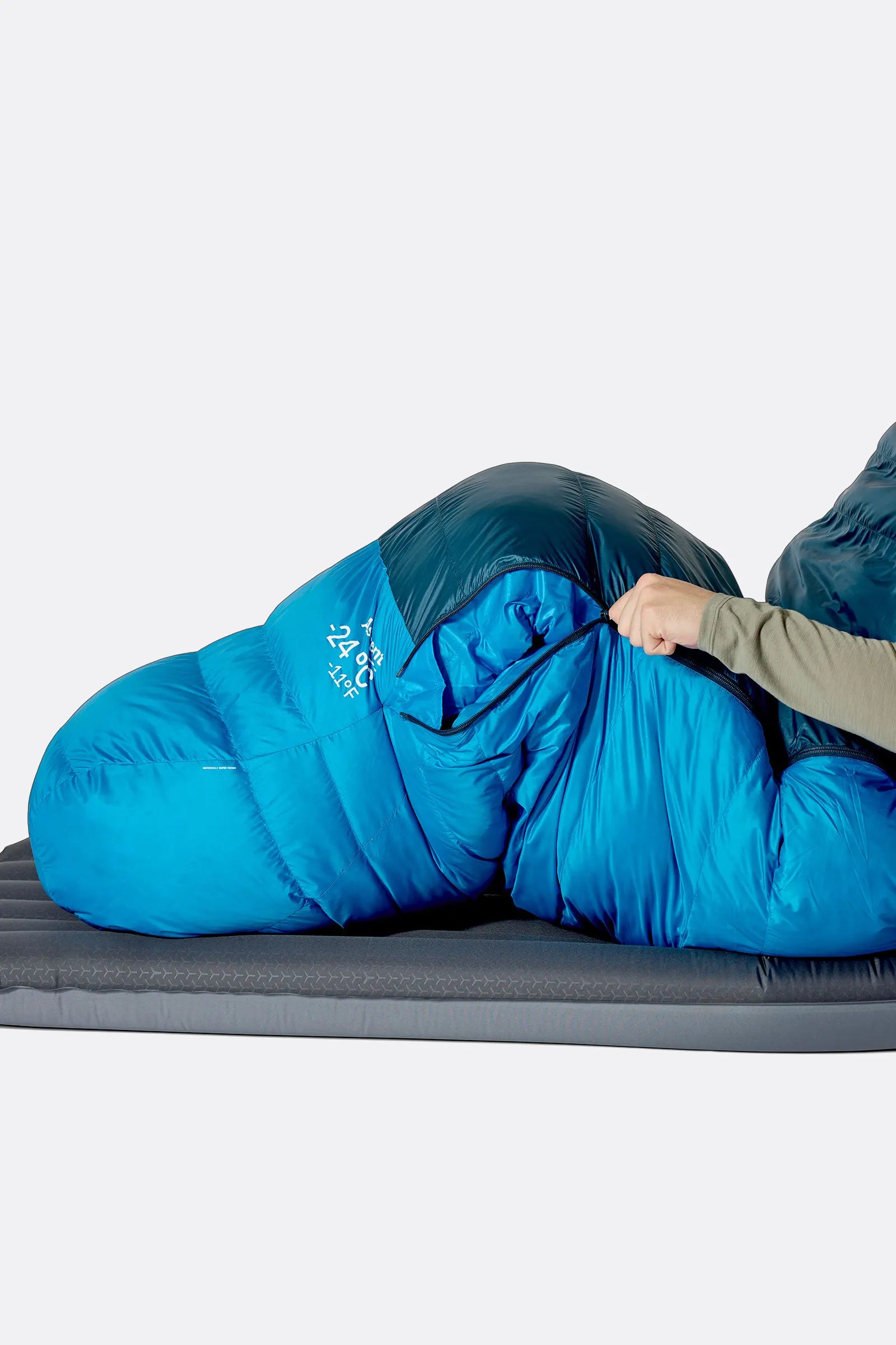 Rab Ascent Down Sleeping Bag (0°C/32F) in Tempest Blue/Maya Blue - Model Lying Side
