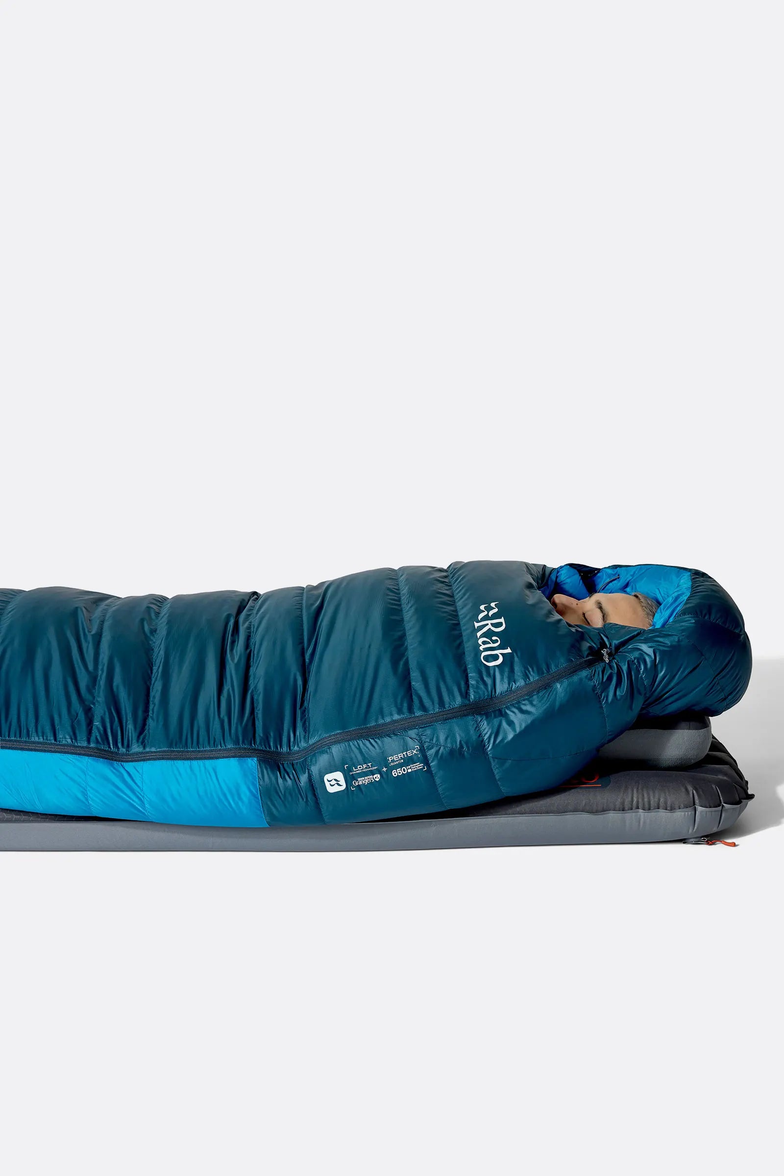 Rab Ascent Down Sleeping Bag (-6°C/21F) in Tempest Blue/Maya Blue - Model Lying Flat