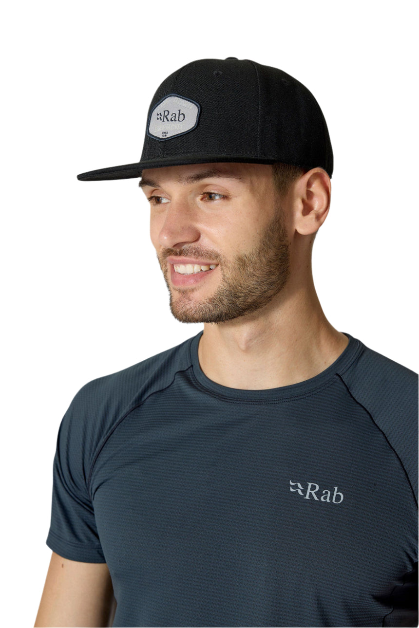 Rab Axion Badge Cap in Beluga - three-quarter, worn