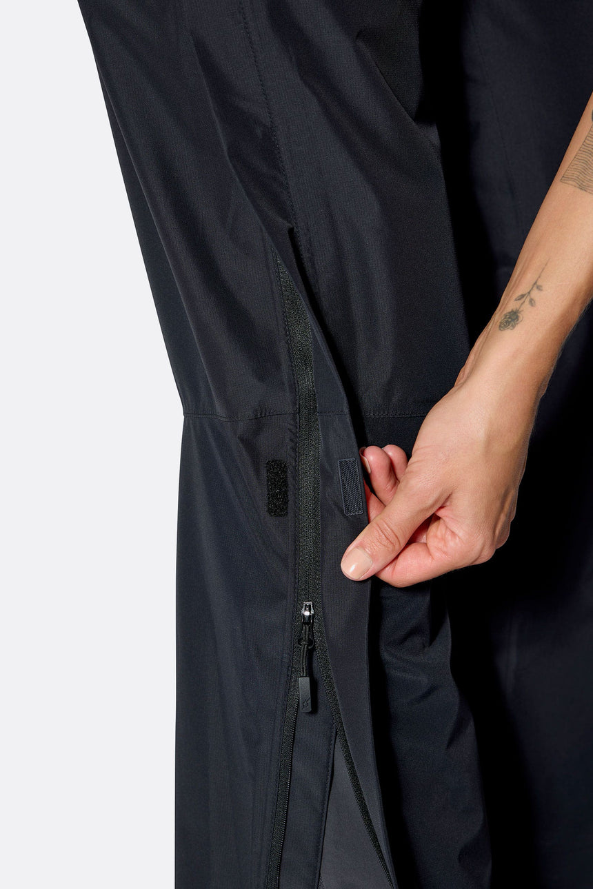 Rab Women's Downpour Waterproof Pants in Black - fabric detail, worn