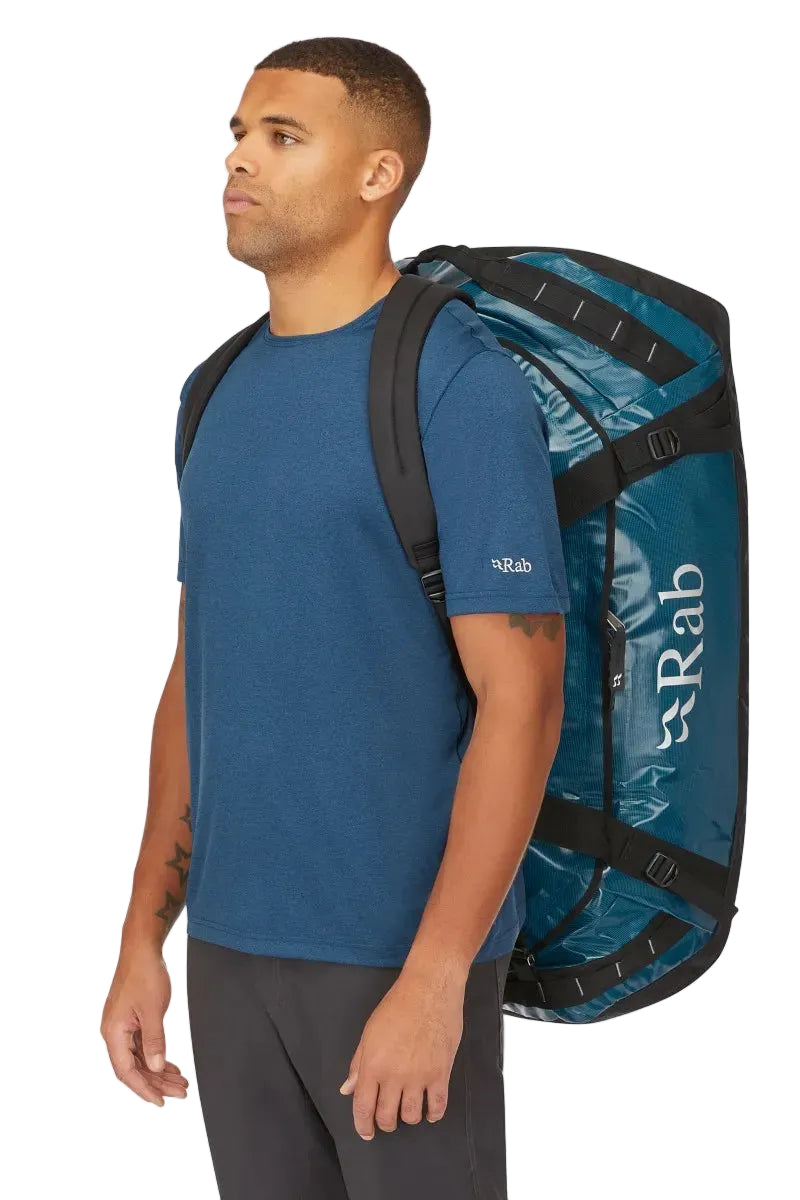 Rab Expedition II 120L Kitbag in Blue - Model Wearing as Backpack Front View
