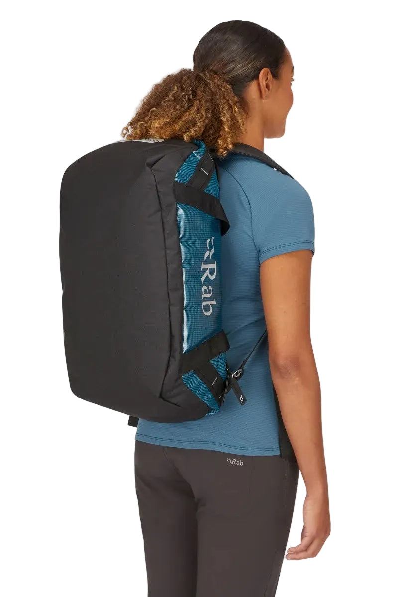 Rab Expedition II 30L Kitbag in Blue - Model Wearing as Backpack Side View Alternative