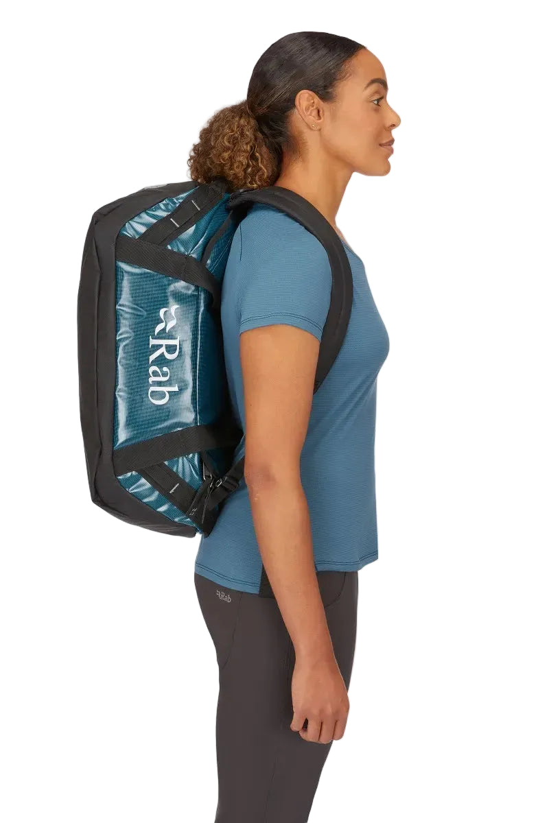 Rab Expedition II 30L Kitbag in Blue - Model Wearing as Backpack Side View