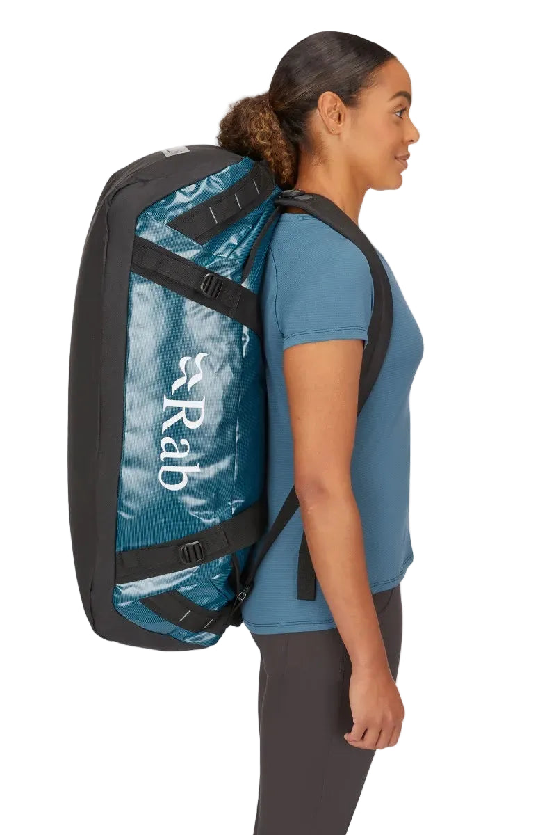Rab Expedition II 80L Kitbag in Blue - Model Wearing as Backpack Side View
