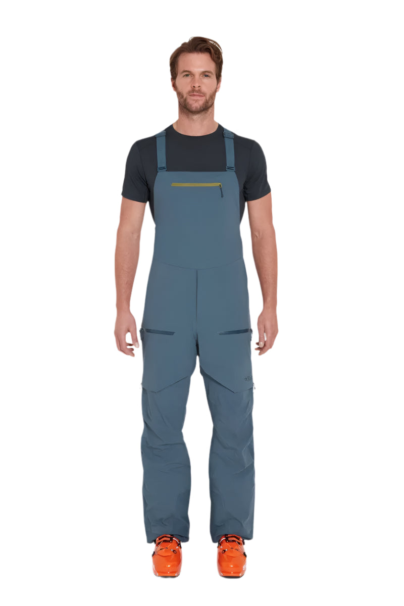 Rab Men's Khroma Kinetic Waterproof Bib Pants in Orion Blue - worn, front