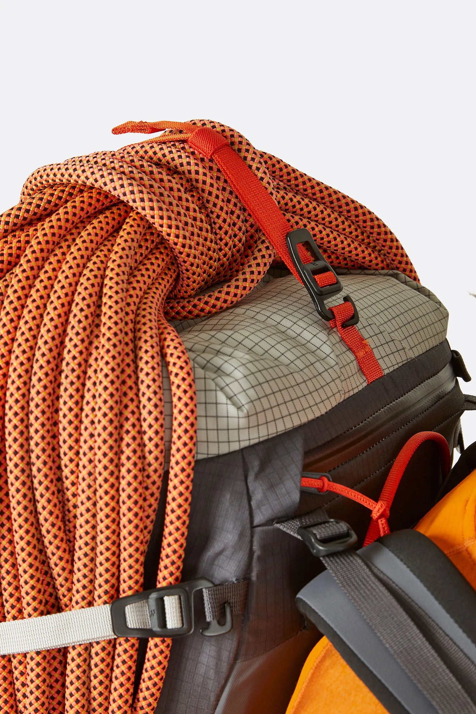 Rab Latok 28L Mountain Pack in Pewter - Model Side View with Rope Loaded