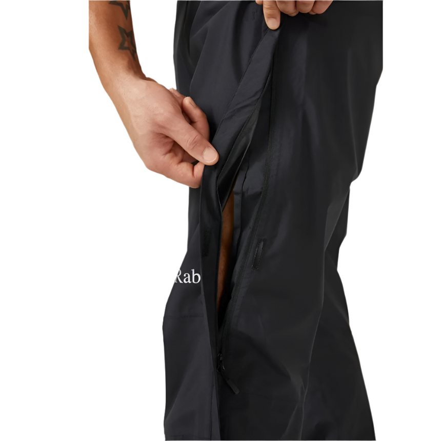 Rab Men's Downpour Eco Waterproof Full Zip Pants in Black - side zip detail, worn