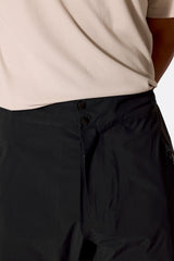 Rab Men's Firewall Guide Waterproof Pants in Black - hip pocket detail on model