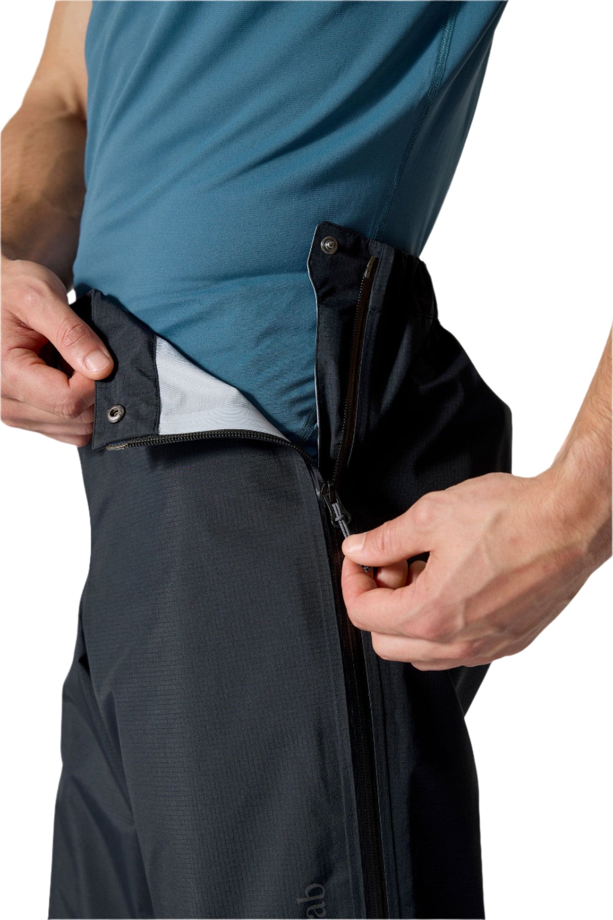 Rab Men's Firewall Mountain Waterproof Pants in Black - waistband detail, worn