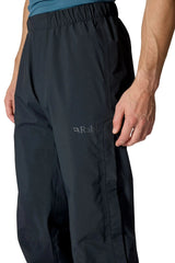 Rab Men's Firewall Waterproof Pants in Black - side detail, worn