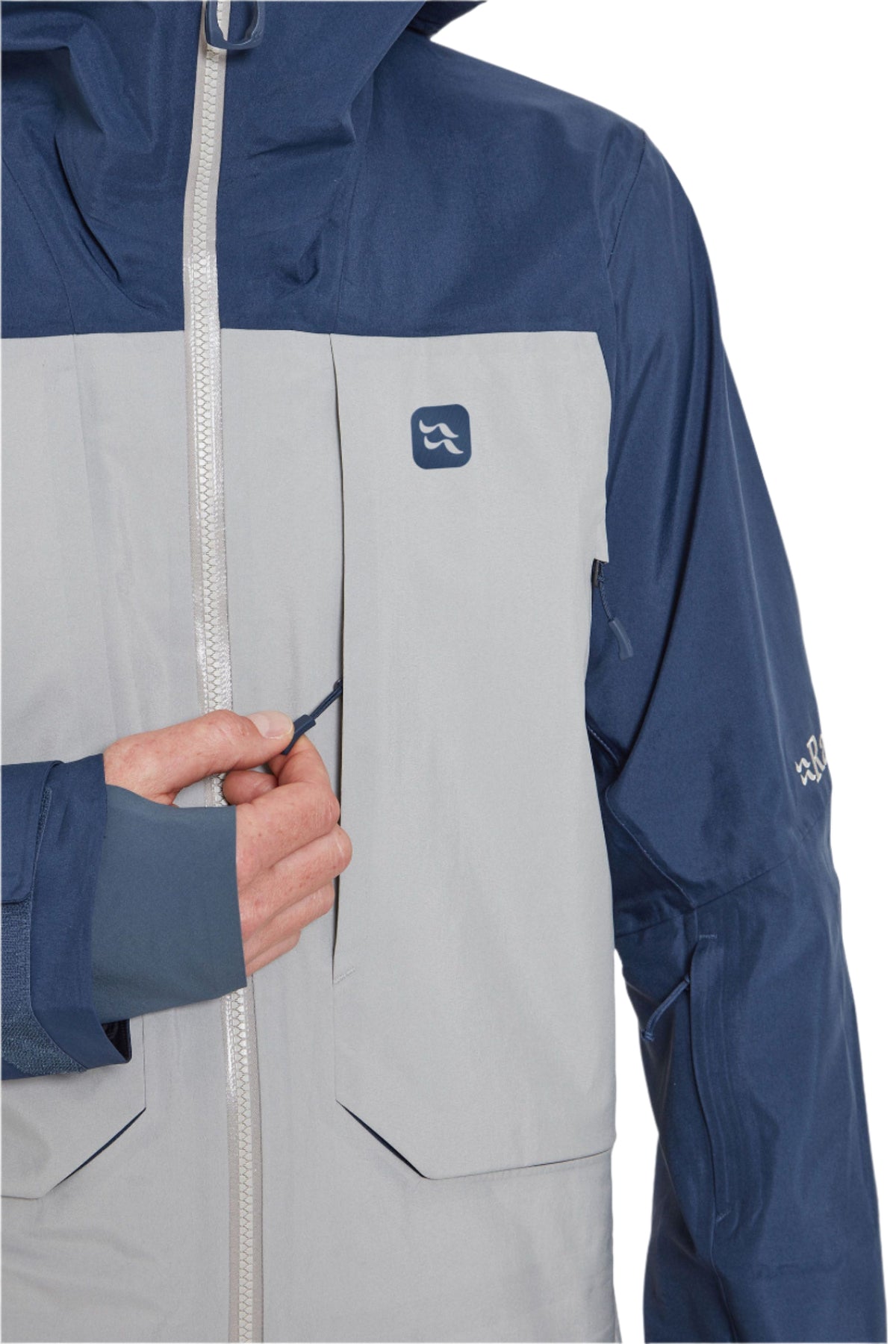 Rab Men's Khroma Converge GORE-TEX Ski Jacket in Tempest Blue/Light Zinc - chest pocket detail, worn (reference only, not a stocked colour)