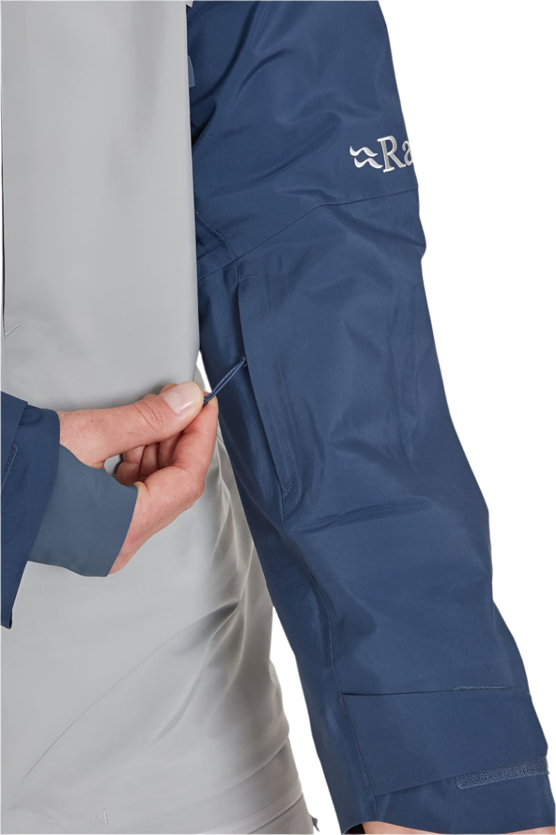 Rab Men's Khroma Converge GORE-TEX Ski Jacket in Tempest Blue/Light Zinc - hand pocket detail, worn (reference only, not a stocked colour)