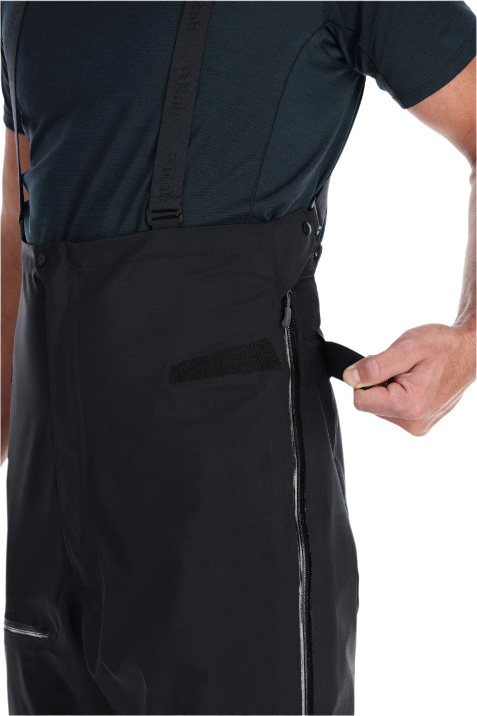 Rab Men's Latok GORE-TEX Pro Bib Pants in Black - side zip detail, worn