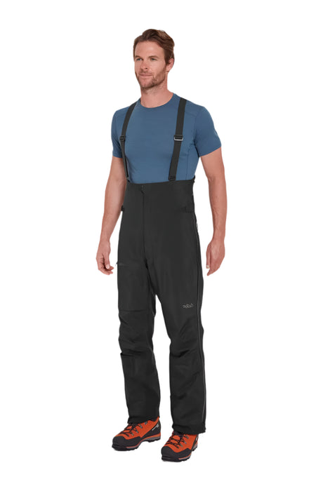 Rab Men's Latok GORE-TEX Pro Bib Pants in Black - worn, front