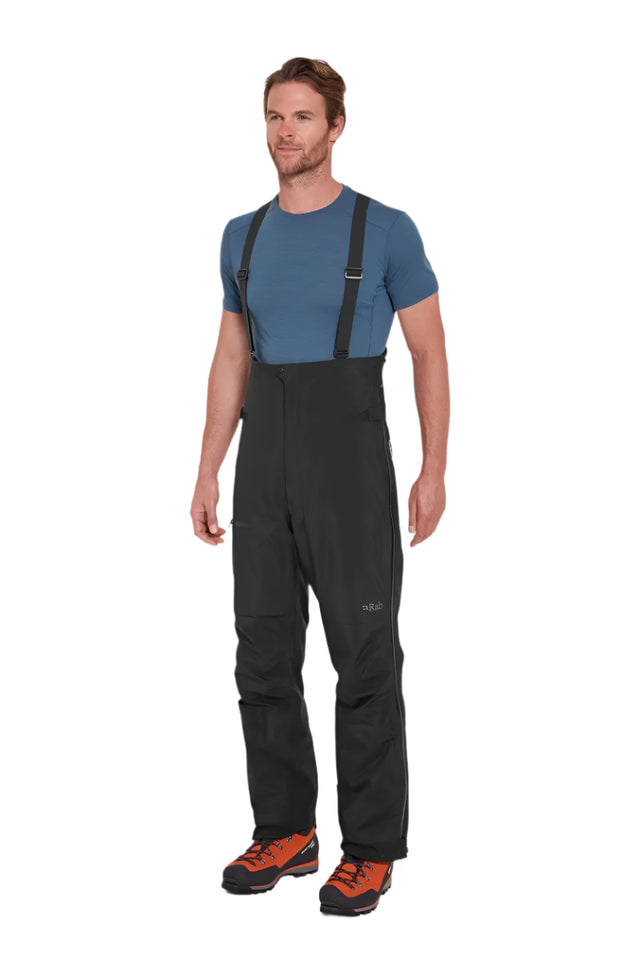 Rab Men's Latok GORE-TEX Pro Bib Pants in Black - worn, front