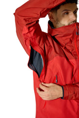 Rab Men's Latok Mountain GORE-TEX Pro Jacket in Tuscan Red/Dark Horizon (styling reference) - hood pull, worn