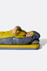 Rab Neutrino Down Sleeping Bag (-18°C/0F) in Graphene/Dark Pollen - Model Lying Wide