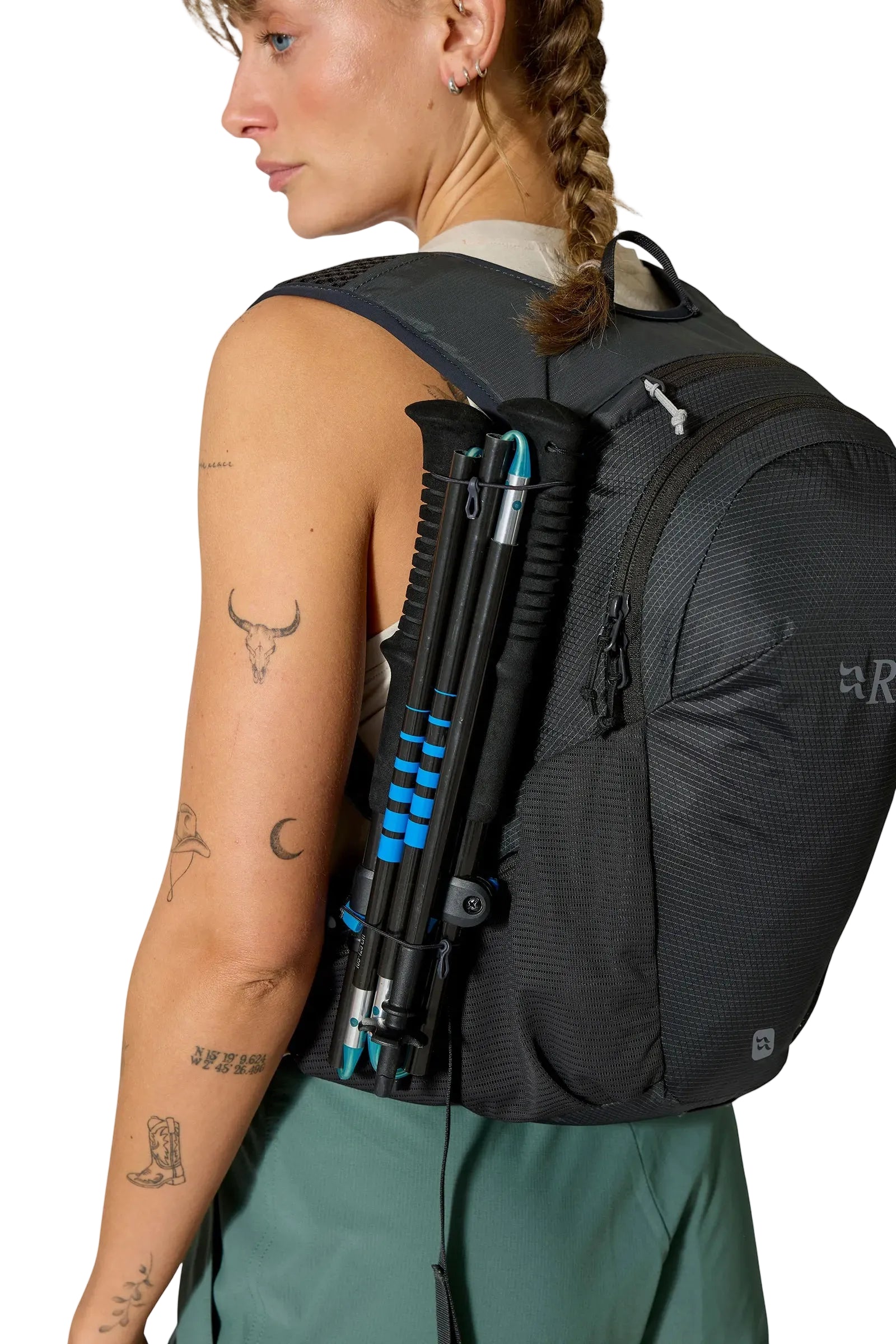 Rab Nitron 12L Lightweight Pack in Anthracite - On Model Side View with Poles