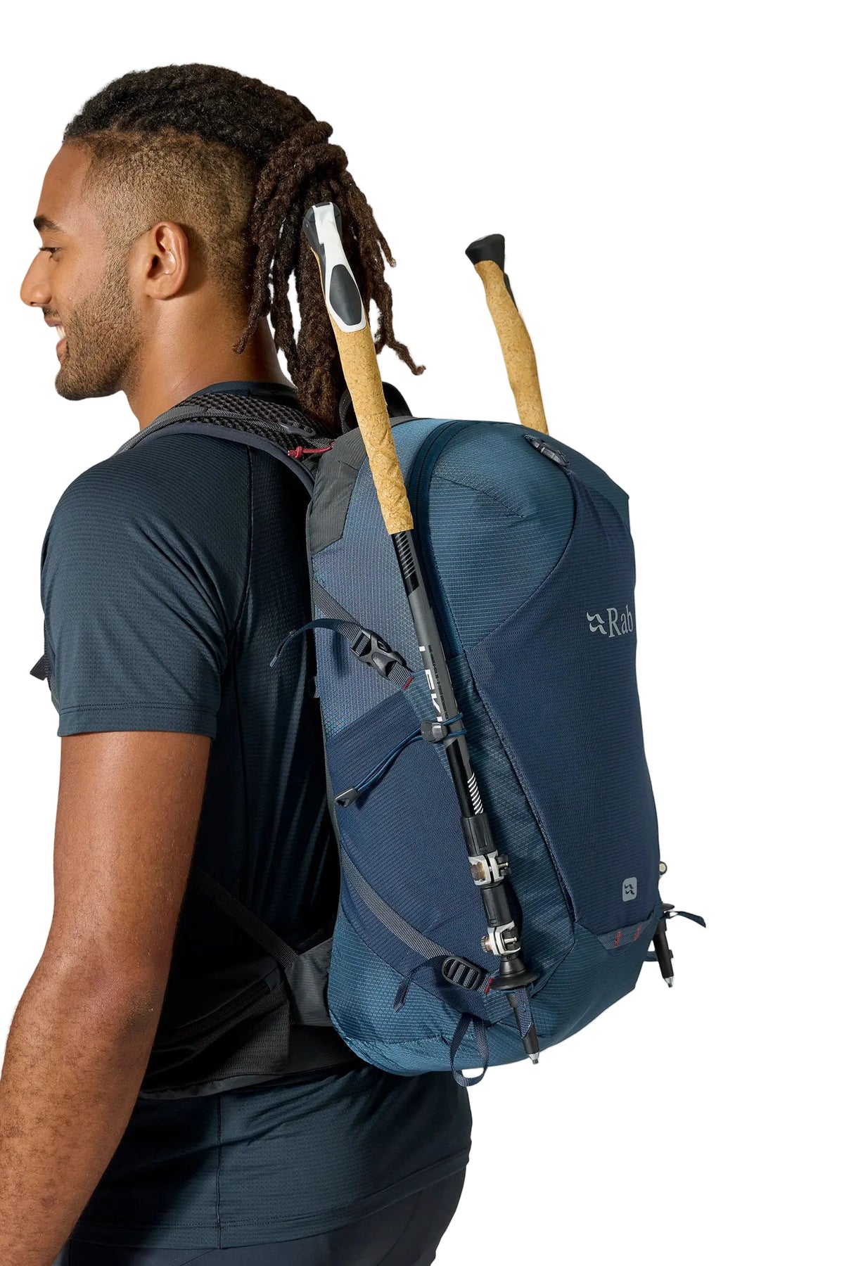 Rab Protium 20L Day Pack in Tempest Blue - On Model Side View with Ice Axe