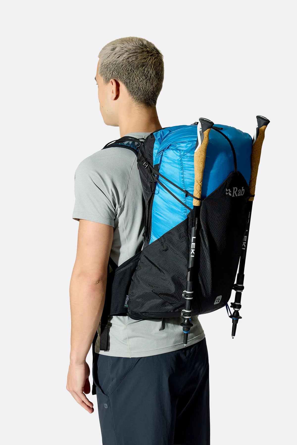 Rab Syclon XP 30L Waterproof Pack in Black/Maya Blue - Back View On Model 4