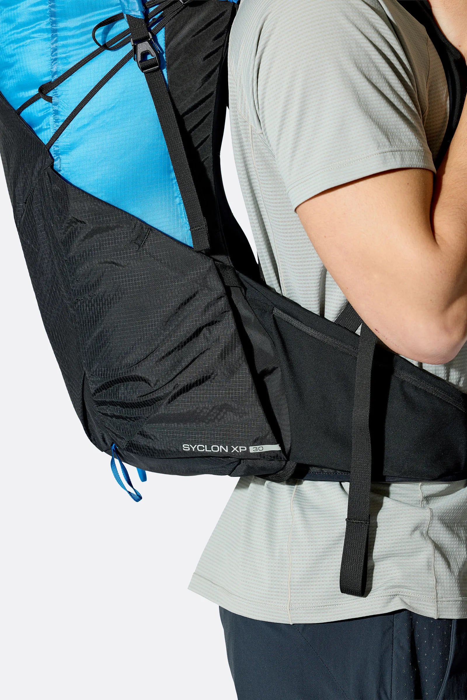 Rab Syclon XP 30L Waterproof Pack in Black/Maya Blue - Back View On Model