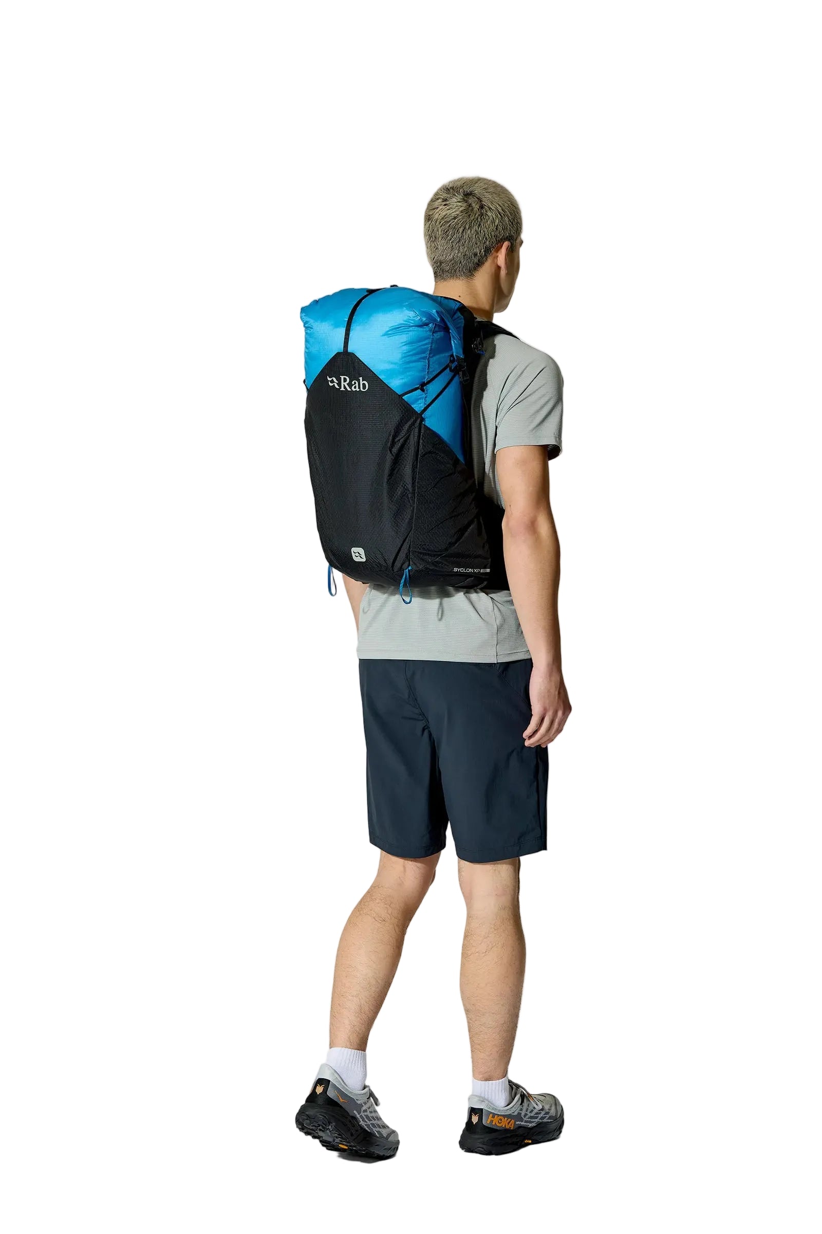 Rab Syclon XP 30L Waterproof Pack in Black/Maya Blue - Side View On Model 4